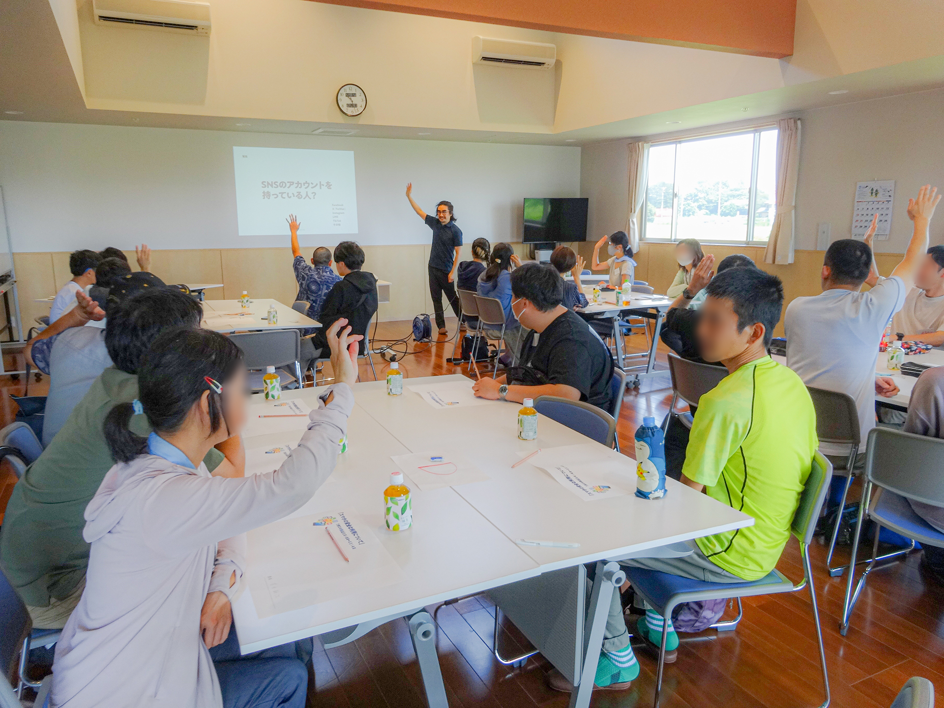 令和7年度第1回在職者交流会で講義中の写真
